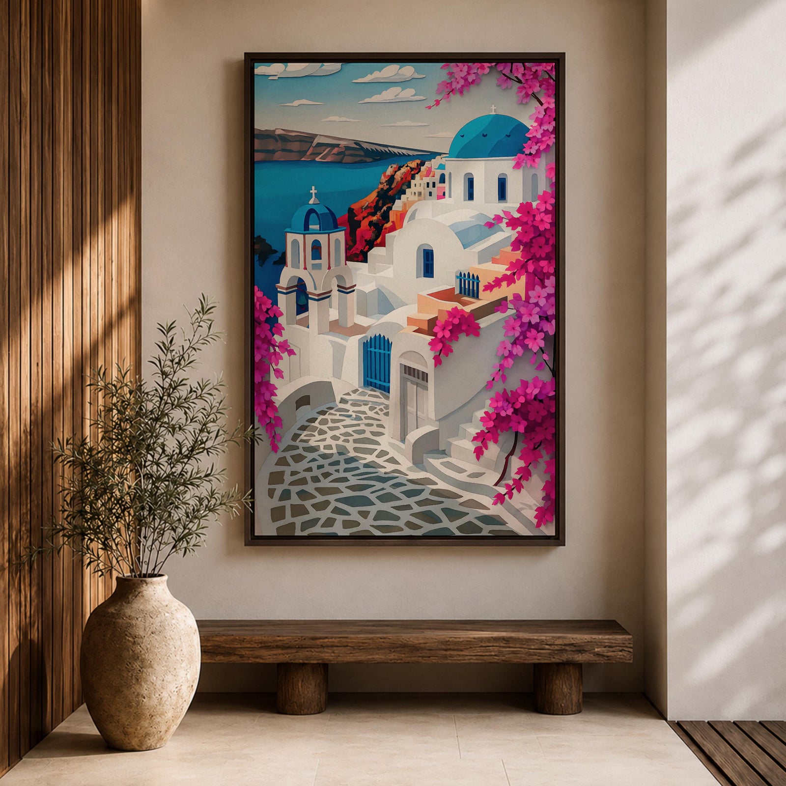 A vibrant framed canvas depicting Santorini, Greece, featuring iconic white buildings with blue domes, winding cobblestone paths, and bright bougainvillea flowers overlooking a deep blue sea, rendered in a clean, graphic style emphasizing architectural shapes and Mediterranean coastal charm.