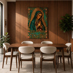 A vintage-style framed canvas depicting Our Lady of Guadalupe with her hands clasped in prayer, wearing a teal mantle adorned with stars and a golden halo radiating behind her. The artwork features intricate floral patterns surrounding the figure, emphasizing traditional Mexican Catholic iconography.