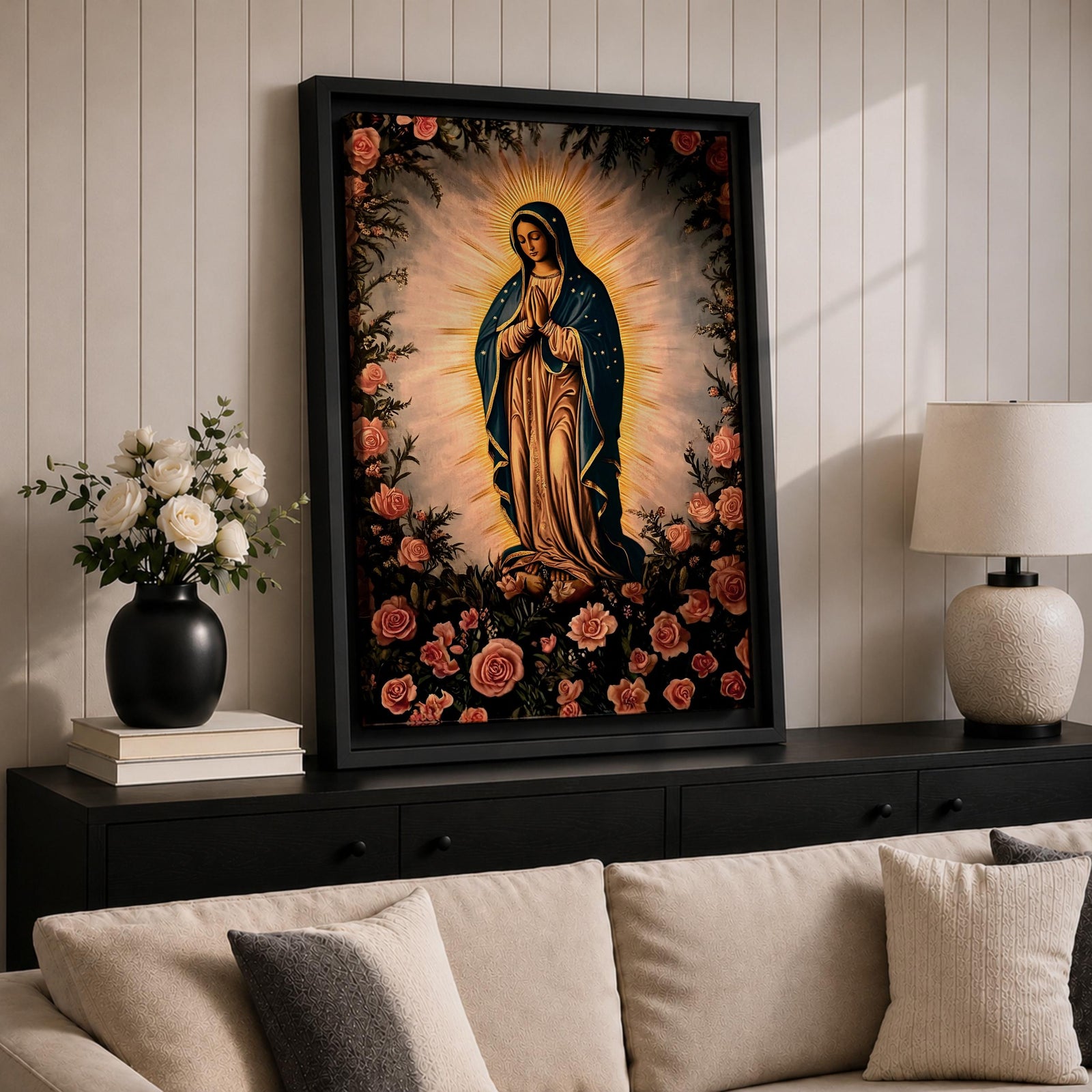 A detailed framed canvas depicting Our Lady of Guadalupe, also known as Virgin of Guadalupe, surrounded by floral motifs. The artwork features a traditional religious figure with a radiant halo and a floral border, rendered in a classic style suitable for Catholic-themed decor.
