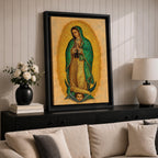 This artwork depicts Our Lady of Guadalupe rendered in a detailed mosaic style with vibrant gold and green tones. The figure is shown with hands clasped in prayer, surrounded by a radiant golden aura, and standing on a crescent moon supported by an angelic face below, capturing the iconic religious imagery.