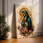 A detailed framed canvas print depicting Our Lady of Guadalupe with hands clasped in prayer, wearing a blue mantle and surrounded by a golden aura and pink roses, rendered in a vibrant, illustrative style emphasizing cultural and religious symbolism.