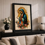 A detailed framed canvas print depicting Our Lady of Guadalupe with hands clasped in prayer, wearing a blue mantle and surrounded by a golden aura and pink roses, rendered in a vibrant, illustrative style emphasizing cultural and religious symbolism.