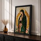 A devotional depiction of the Virgen de Guadalupe standing in prayer with hands clasped, wearing a rose pink gown and a teal mantle covered with gold stars, surrounded by radiant golden sun rays and standing above a crescent moon with a small angel beneath, rendered in a modern Mexican Catholic style with vibrant colors and sacred symbolism.