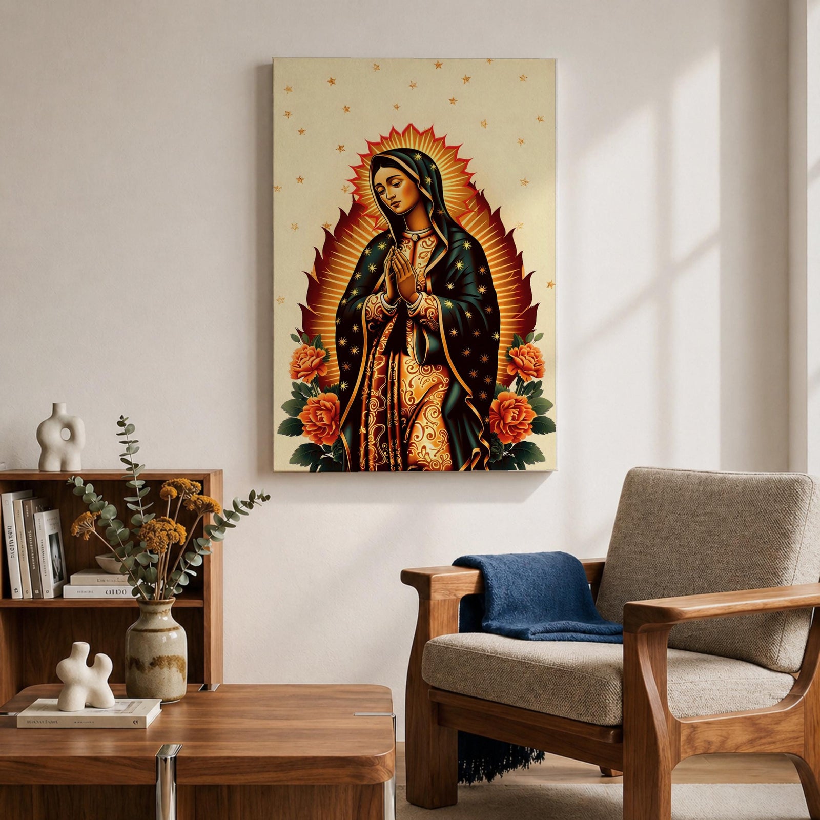 A devotional depiction of Our Lady of Guadalupe standing with hands folded in prayer, wearing a rose pink gown and a teal mantle filled with gold stars, surrounded by radiant golden rays and positioned above a crescent moon with an angel beneath, framed by colorful floral elements in a Mexican Catholic devotional style.