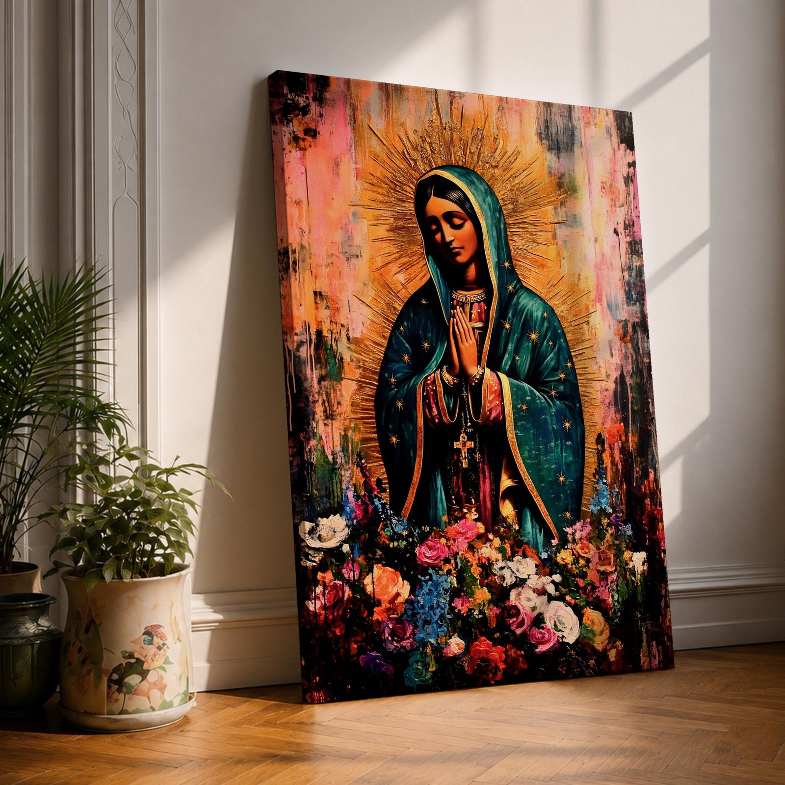 A devotional depiction of La Virgen Morena as Our Lady of Guadalupe standing with hands clasped in prayer, wearing a rose colored gown and a teal mantle covered in gold stars, surrounded by radiant golden rays and standing above a crescent moon with an angel beneath, framed by floral elements in a Mexican Catholic style.