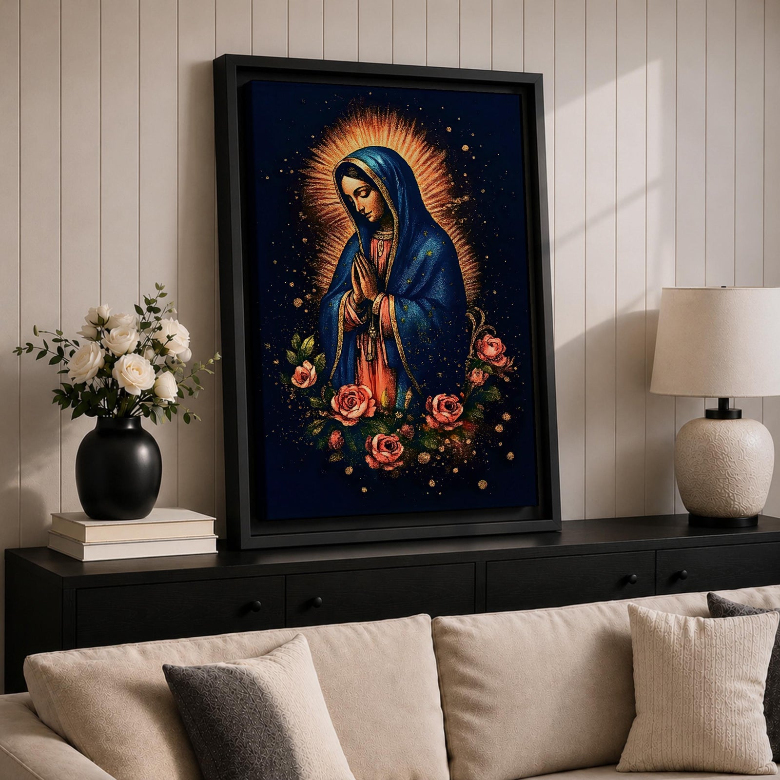 Illustration of Our Lady of Guadalupe standing with hands clasped in prayer, wearing a rose colored gown and star covered teal mantle surrounded by radiant golden rays, framed by decorative floral elements, rendered in warm tones with soft shading in a modern devotional style inspired by traditional Mexican Catholic imagery.
