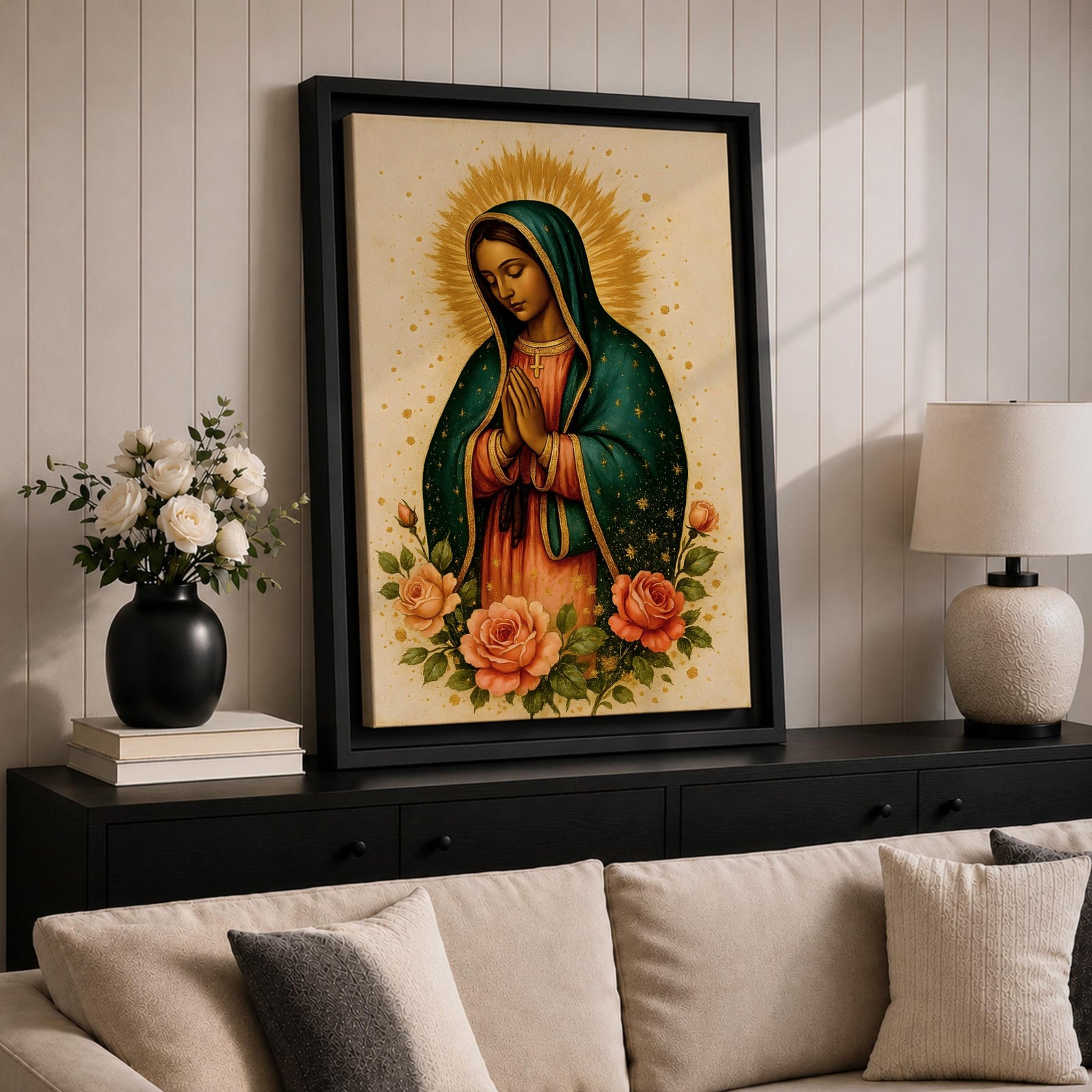 Traditional devotional illustration of Our Lady of Guadalupe standing with hands clasped in prayer, wearing a rose colored gown and a teal mantle covered with gold stars, surrounded by radiant golden rays and supported by a small angel beneath her, rendered in warm antique tones with delicate shading in a classic Mexican Catholic icon style.