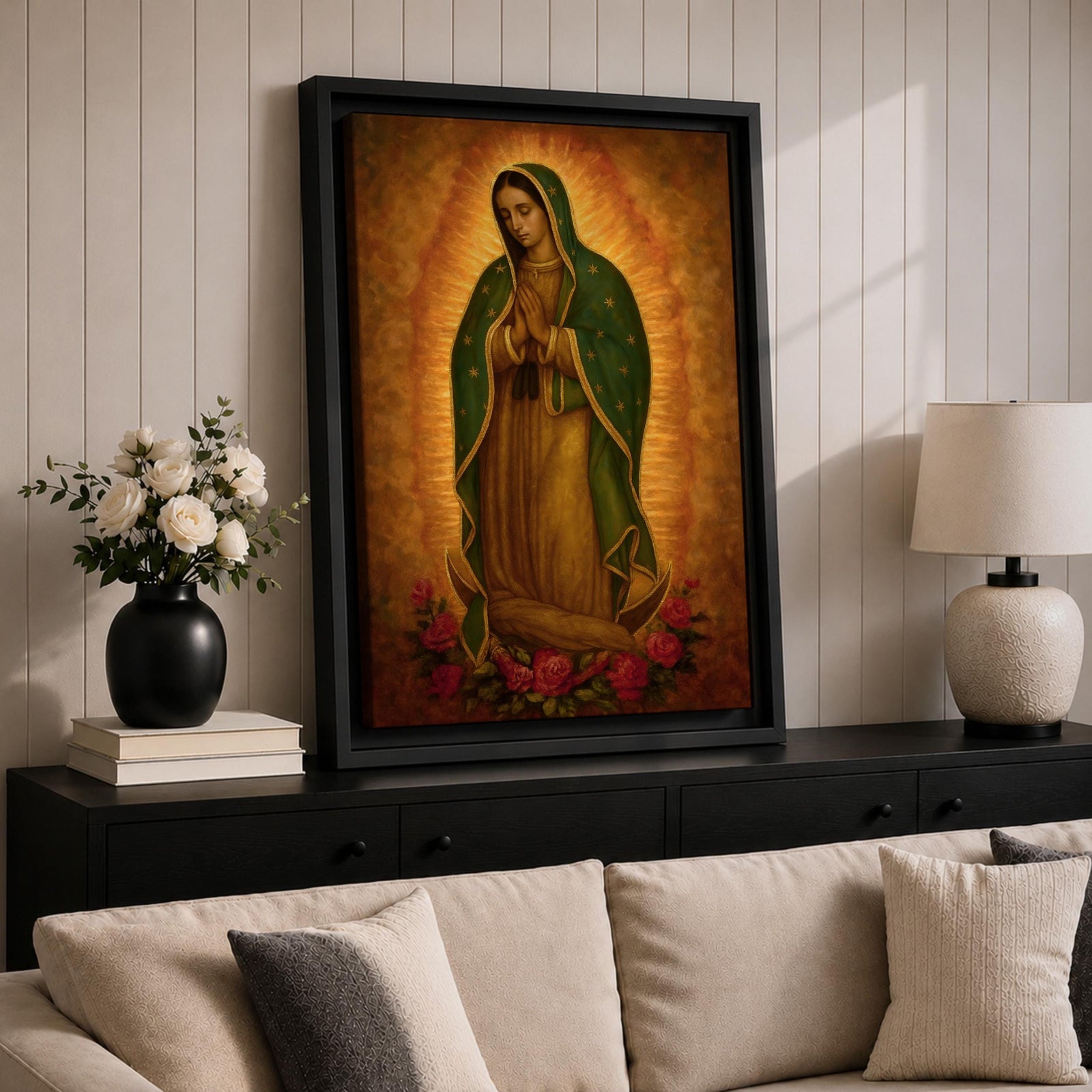 Traditional devotional illustration of the Virgin of Guadalupe standing with hands clasped in prayer, wearing a rose colored gown and a teal mantle covered with gold stars, surrounded by radiant golden rays with a small angel beneath her, rendered in warm antique tones with delicate shading in a classic Mexican Catholic icon style.