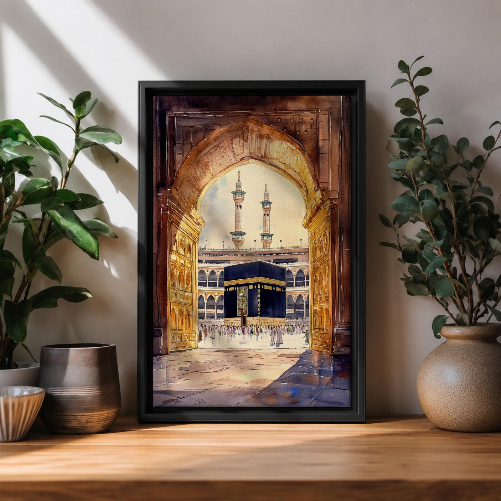 Watercolor-style artwork of the Kaaba at Masjid Al Haram in Mecca viewed through a grand mosque archway with open golden doors and pilgrims gathered in the courtyard beneath tall minarets.
