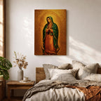 Devotional illustration of the Virgin of Guadalupe also known as the Mexican Virgencita standing with hands clasped in prayer, wearing a rose colored gown and a teal mantle covered with gold stars, surrounded by radiant golden rays with a small angel beneath her, rendered with warm tones and soft shading in a traditional Marian Catholic composition.