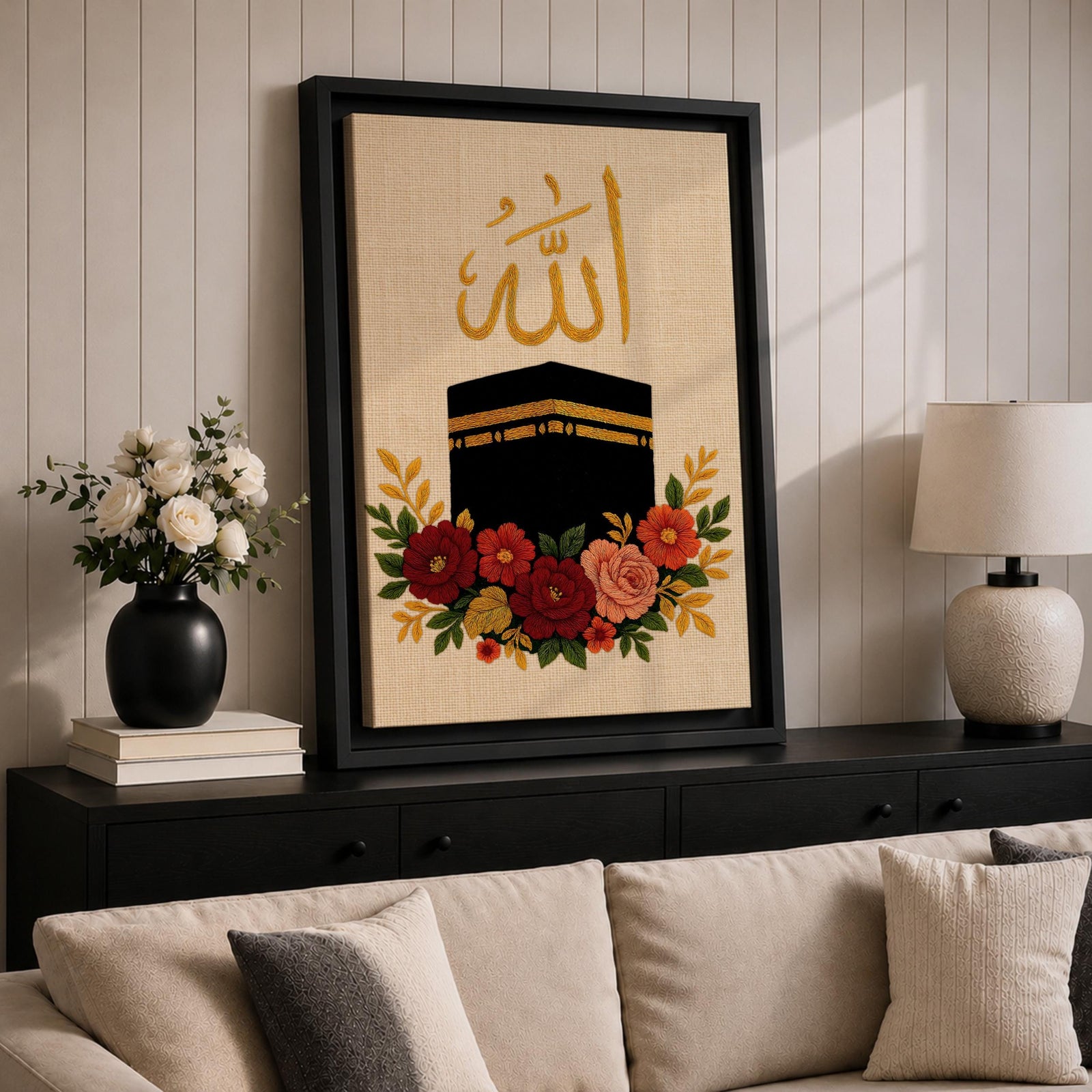 Kaaba wall art featuring Arabic calligraphy of Allah above the sacred Kaaba at Masjid Al-Haram in Mecca with colorful floral embroidery details. Islamic artwork highlighting the holy mosque and calligraphy displayed as framed canvas decor for Muslim homes.