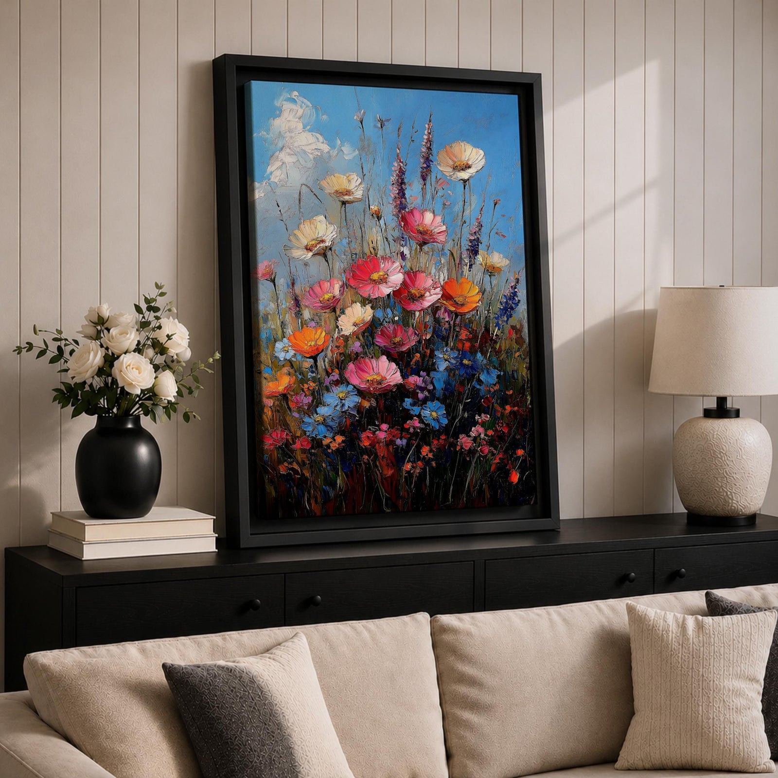 A vibrant impasto painting of a wildflower bouquet featuring pink, orange, cream, and blue flowers against a bright blue sky, rendered with thick textured brushstrokes that emphasize the lively natural floral composition.