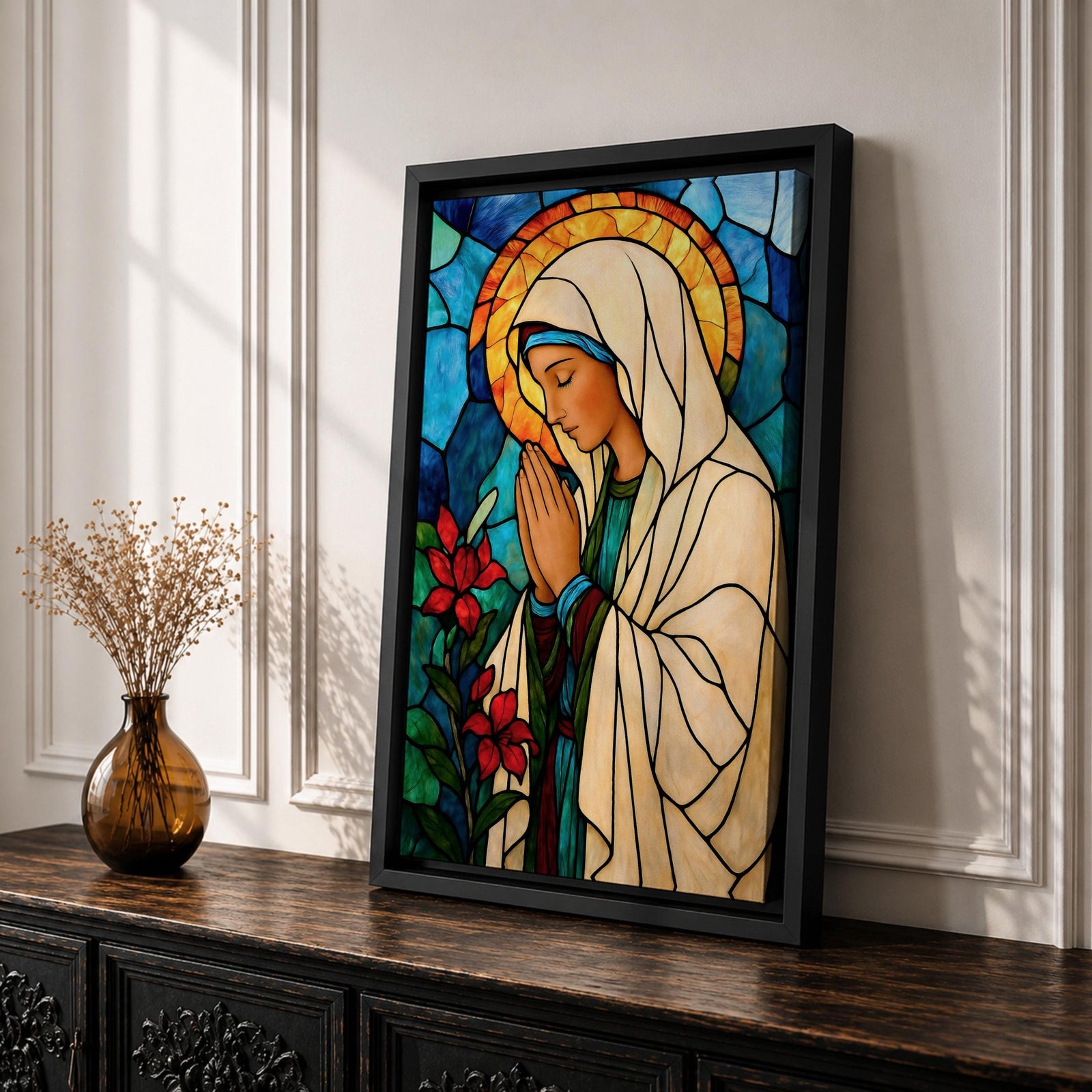 Modern stained glass style illustration of the Virgin Mary shown praying with hands clasped and head gently bowed, wearing flowing robes and a soft halo, composed of luminous jewel toned glass segments and radiant light patterns, rendered with clean lines and glowing color in a contemporary Marian devotional composition.