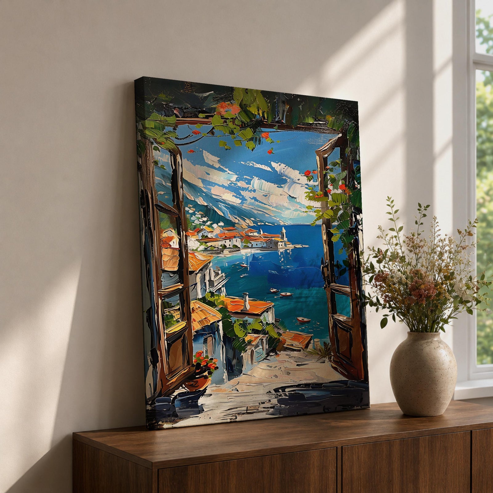 A vibrant framed canvas painting depicting a Mediterranean window opening to a coastal seaside view with terracotta rooftops, boats on deep blue ocean waters, and distant mountains under a bright sky. The artwork captures a scenic landscape with detailed brushstrokes and rich textures.