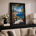 A vibrant framed canvas painting depicting a Mediterranean window opening to a coastal seaside view with terracotta rooftops, boats on deep blue ocean waters, and distant mountains under a bright sky. The artwork captures a scenic landscape with detailed brushstrokes and rich textures.