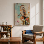 A detailed vintage-style framed canvas art print depicting a barn owl perched on a branch surrounded by wildflowers. The artwork features a rustic, naturalistic approach with soft textures and muted colors, capturing the essence of wildlife and farmhouse charm in a classic animal portrait style.