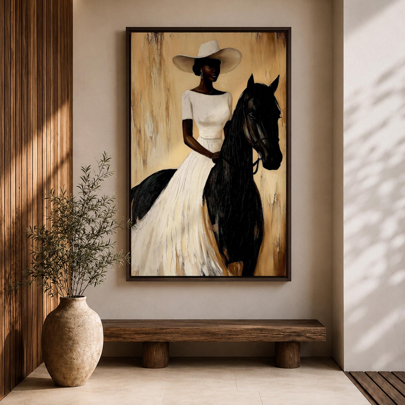 A framed painting of a woman dressed in a white dress and wide-brimmed hat riding a black horse. The artwork features a realistic style with warm beige and brown tones in the background, emphasizing the elegant posture of the rider and the horse’s strong presence.