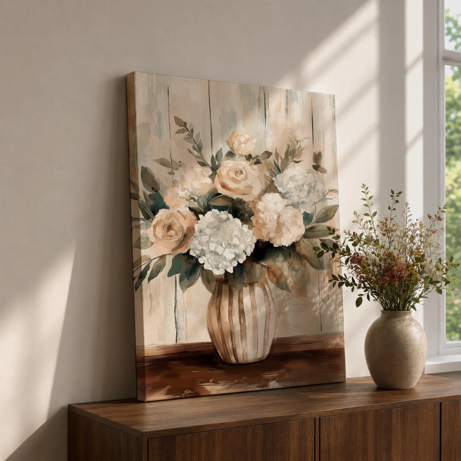 A framed canvas painting of a floral vase featuring a bouquet of roses and hydrangeas with green leaves, rendered in a soft, natural style with muted tones. The artwork emphasizes botanical elements in a rustic decor theme, focusing on detailed flower shapes and natural textures.