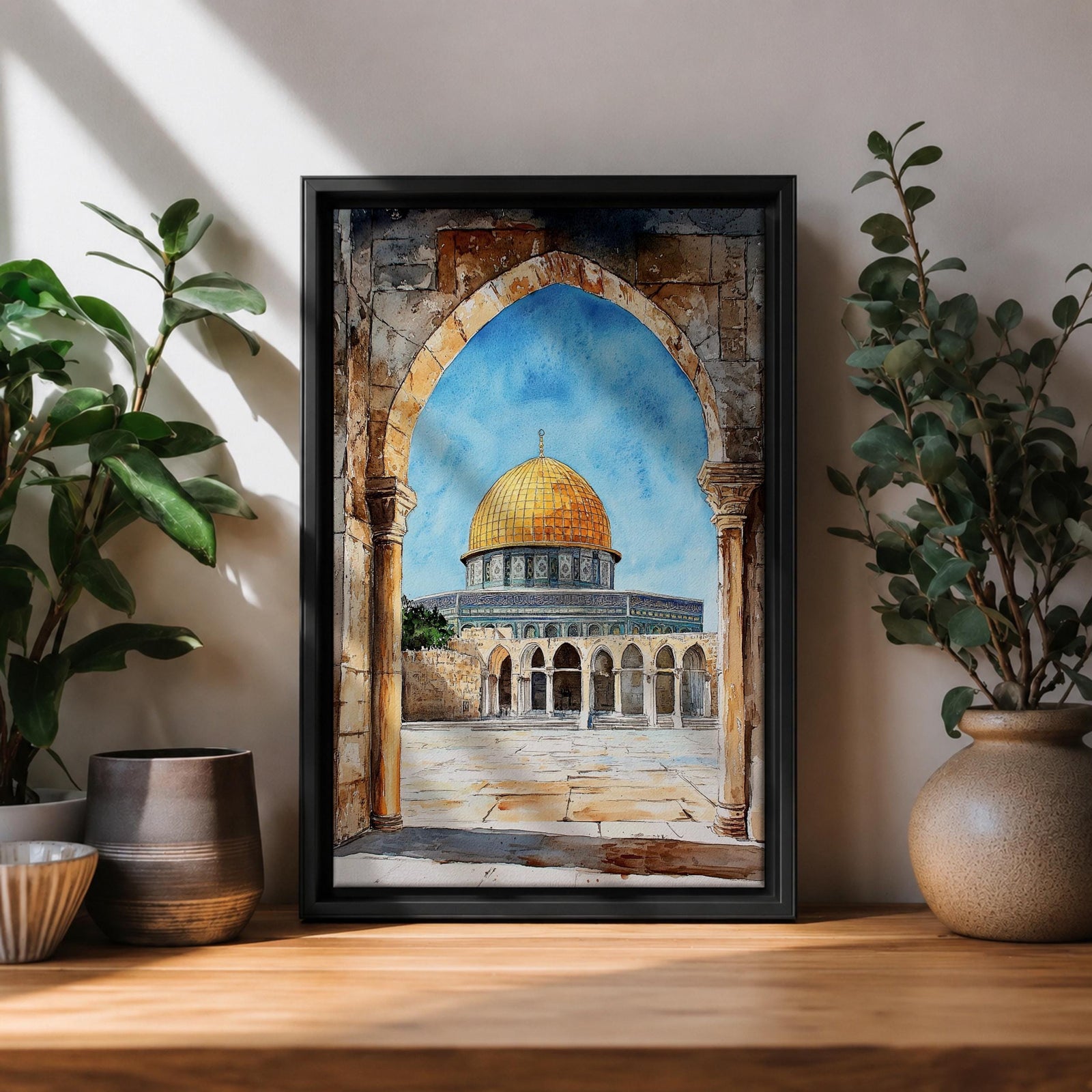 Masjid Al-Aqsa wall art showing the golden Dome of the Rock in Jerusalem framed through a historic stone archway. Islamic canvas artwork featuring the sacred mosque courtyard and architectural arches, perfect for Muslim home decor and mosque-inspired wall art.