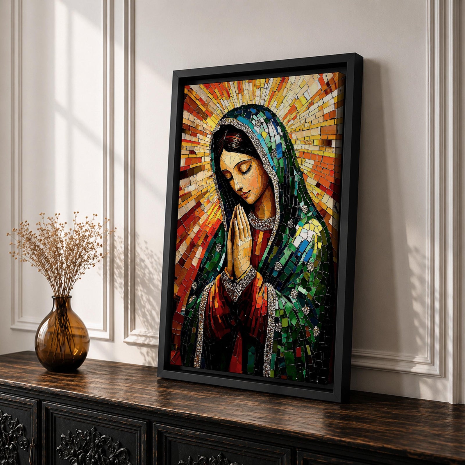 Mosaic style illustration of Our Lady of Guadalupe also known as the Mexican Virgencita standing with hands clasped in prayer, wearing a rose colored gown and a teal mantle covered with gold stars, surrounded by radiant golden rays and composed of small colorful tile patterns with a small angel beneath her in Mexican Catholic devotional style.