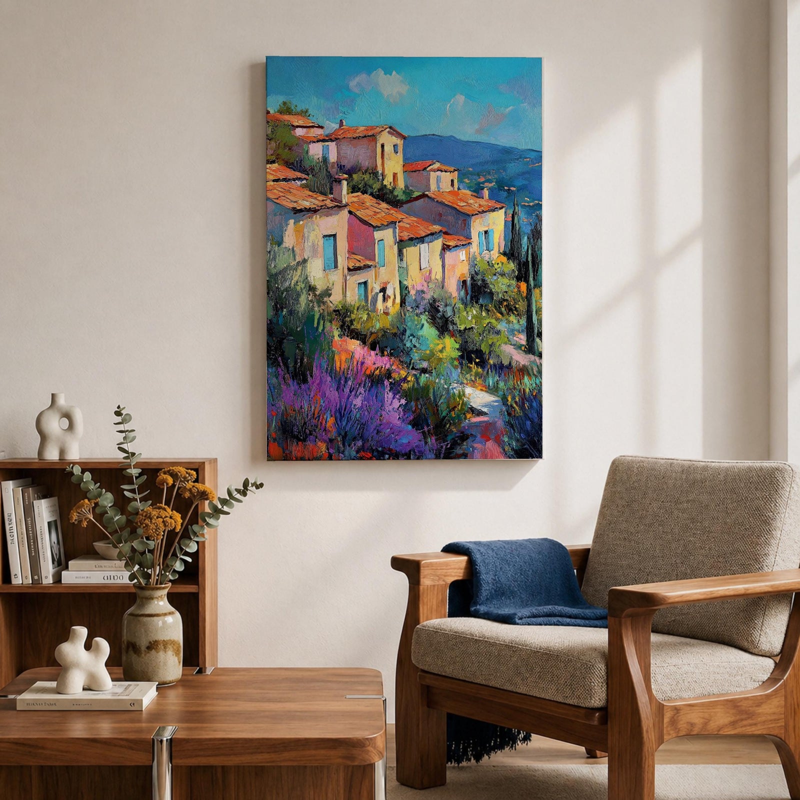 This impasto style painting depicts a vibrant Mediterranean village with terracotta-roofed houses clustered on a hillside surrounded by lush greenery and colorful flowers, set against a bright blue sky and distant mountains, capturing the charm and warmth of a coastal landscape.