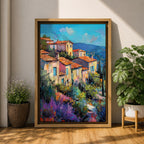 This impasto style painting depicts a vibrant Mediterranean village with terracotta-roofed houses clustered on a hillside surrounded by lush greenery and colorful flowers, set against a bright blue sky and distant mountains, capturing the charm and warmth of a coastal landscape.