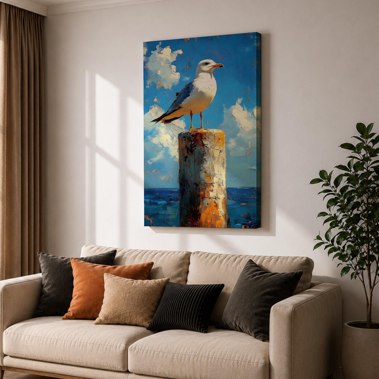 A framed canvas painting of a seagull perched on a weathered post against a bright blue sky with fluffy clouds and a distant ocean horizon. The artwork captures the bird in a realistic style with textured brushstrokes emphasizing the natural coastal scene.