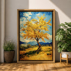 An impasto style painting of a golden tree with vibrant yellow leaves standing alone in a rustic landscape with rolling hills and distant mountains under a partly cloudy blue sky. The textured brushstrokes create a rich, tactile effect emphasizing the natural beauty of the tree and countryside.