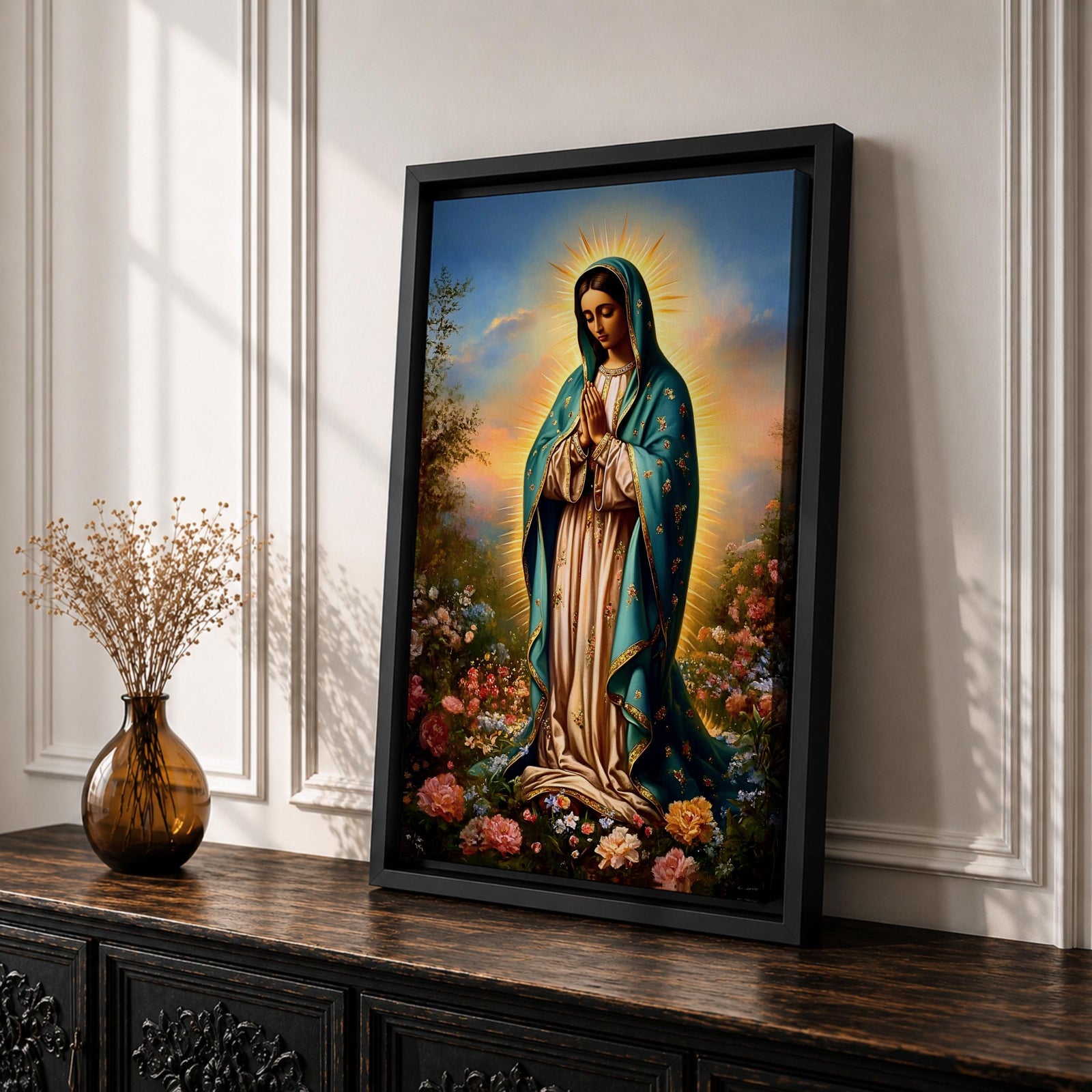 A detailed framed canvas print depicting Our Lady of Guadalupe, also known as the Virgin of Guadalupe, standing with hands clasped in prayer, surrounded by radiant light and floral elements, rendered in a realistic and vibrant style emphasizing religious Catholic iconography.