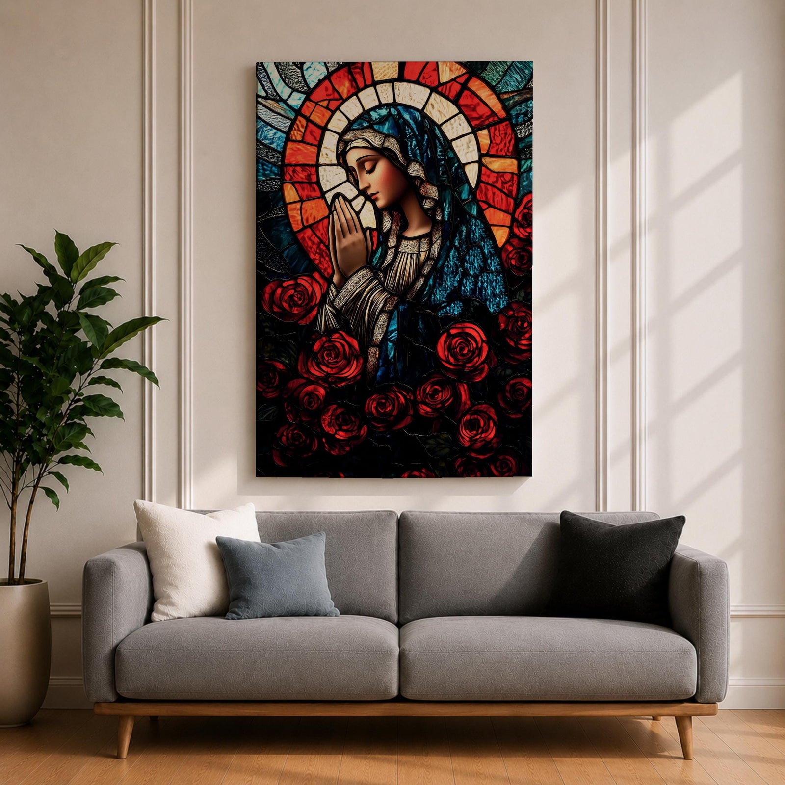 A stained glass style depiction of Virgin Mary with hands clasped in prayer, surrounded by red roses and a radiant halo behind her head. The image uses vibrant colors and intricate glass-like textures to create a mosaic effect emphasizing religious devotion and reverence.