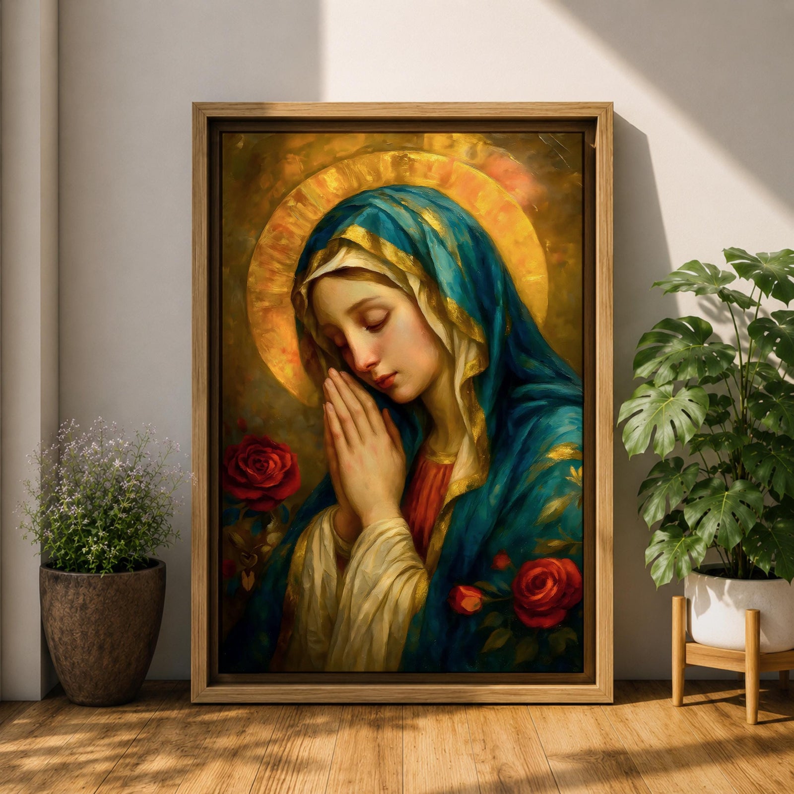 Portrait painting of the Blessed Virgin Mary shown with eyes gently closed and hands clasped in prayer, wearing a blue veil and cream garment while a radiant golden halo glows behind her head, with red roses appearing beside her in a devotional Madonna composition rendered in a soft classical style with warm painterly brushwork.