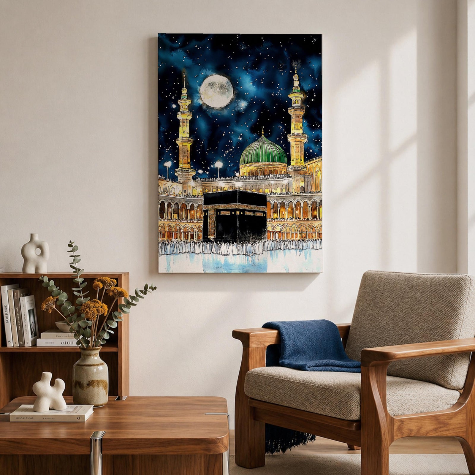 Painting of the Kaaba at Masjid Al Haram under a night sky filled with stars and a large full moon, surrounded by illuminated mosque arcades and tall minarets with pilgrims gathered around the sacred cube, while the green dome of Masjid Al Nabawi appears in the background within the composition.