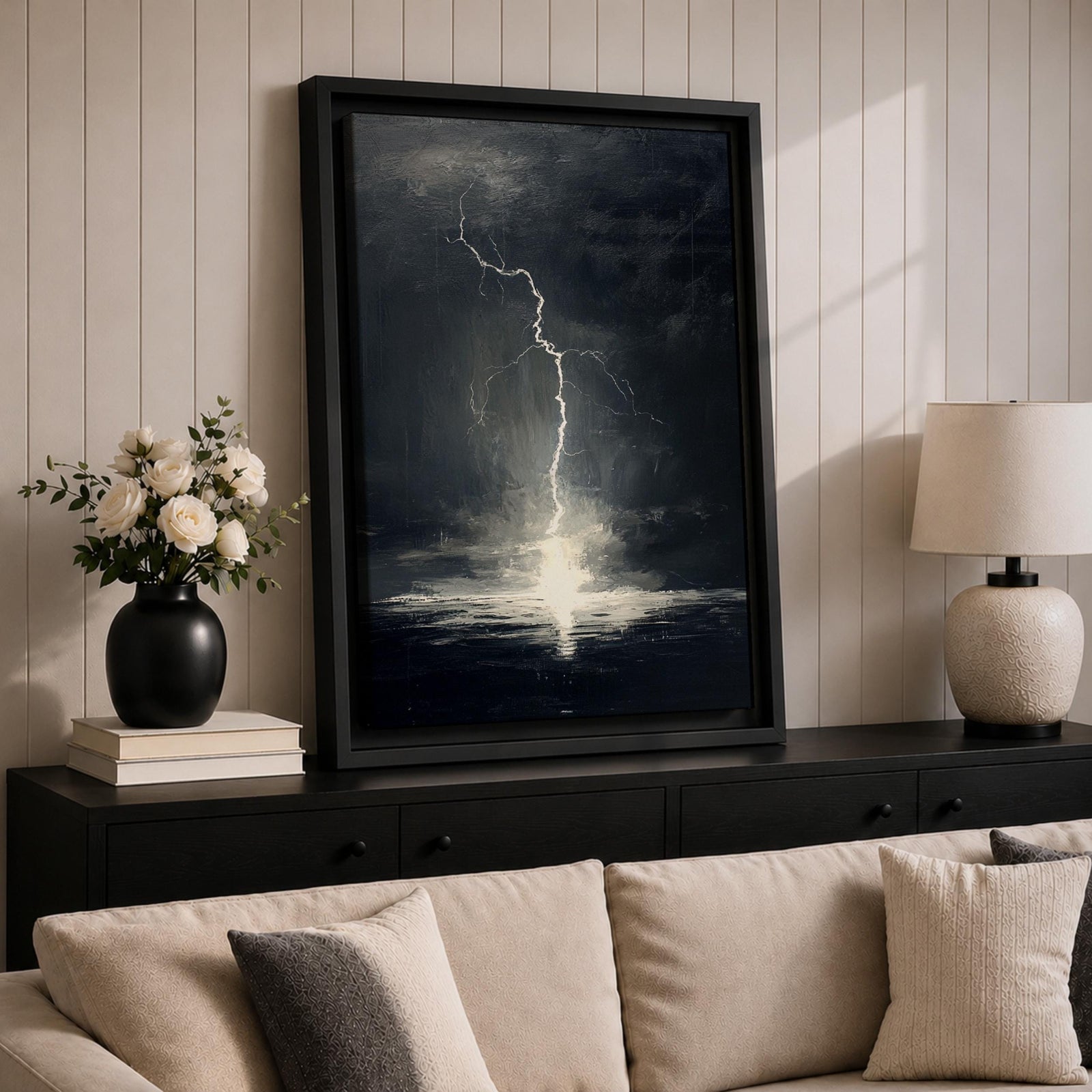 A framed canvas wall art depicting a dramatic lightning bolt striking over a stormy ocean seascape. The dark clouds and turbulent water create a powerful natural scene emphasizing the raw energy of lightning over the sea, captured in a realistic style.