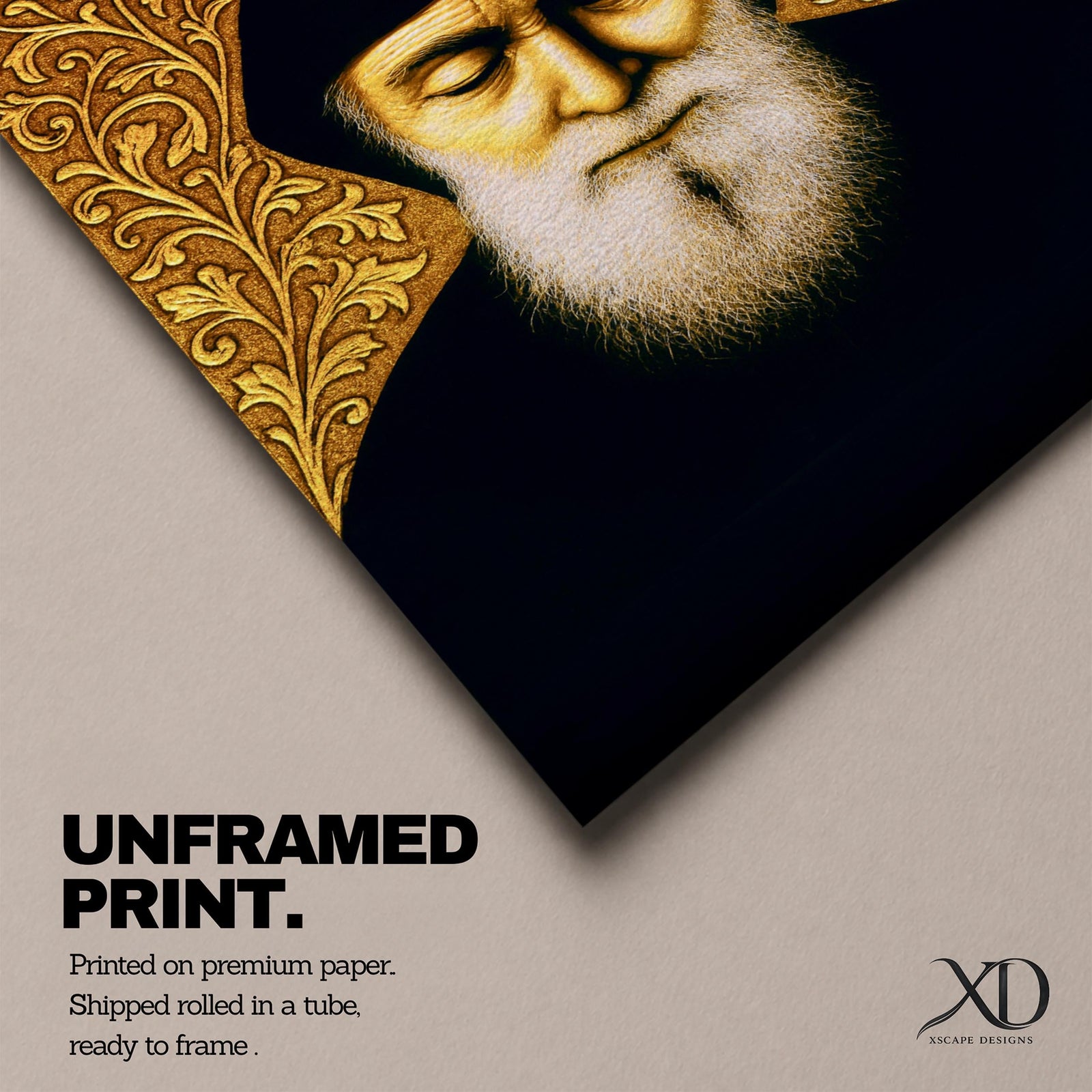 Portrait of Saint Charbel shown with a hooded monastic robe and long beard, eyes closed in prayerful contemplation, framed by ornate decorative patterns typical of devotional Christian iconography. The composition presents the Lebanese Maronite monk saint in a traditional religious portrait format emphasizing quiet devotion.