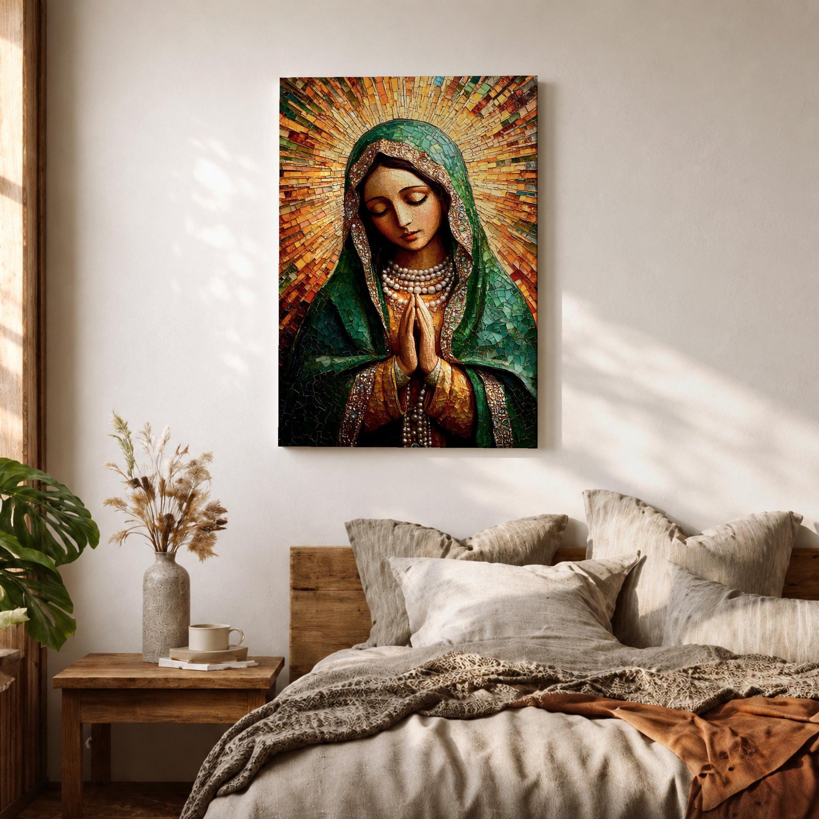 Mosaic style portrait of the Virgin Mary shown with head bowed and hands clasped in prayer, composed of small tile like fragments forming a devotional Catholic image. Radiant rays expand behind her while a detailed veil and necklace are rendered in textured mosaic pieces typical of religious icon artwork.