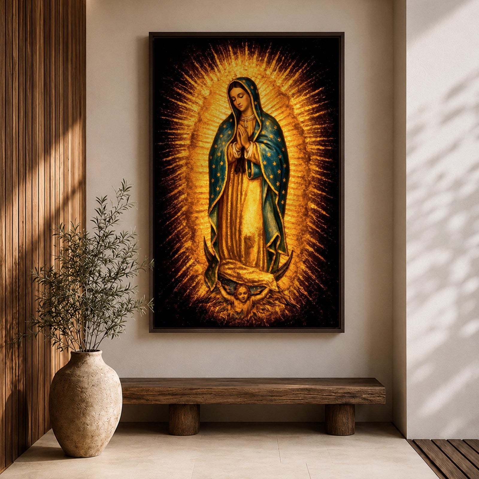 Traditional Our Lady of Guadalupe Catholic icon showing the Virgin Mary standing in prayer with hands clasped, surrounded by radiant sunburst rays. She wears a star covered mantle and flowing robe while standing on a crescent moon supported by an angel below, presented in a classic devotional religious composition associated with Mexican Catholic imagery.