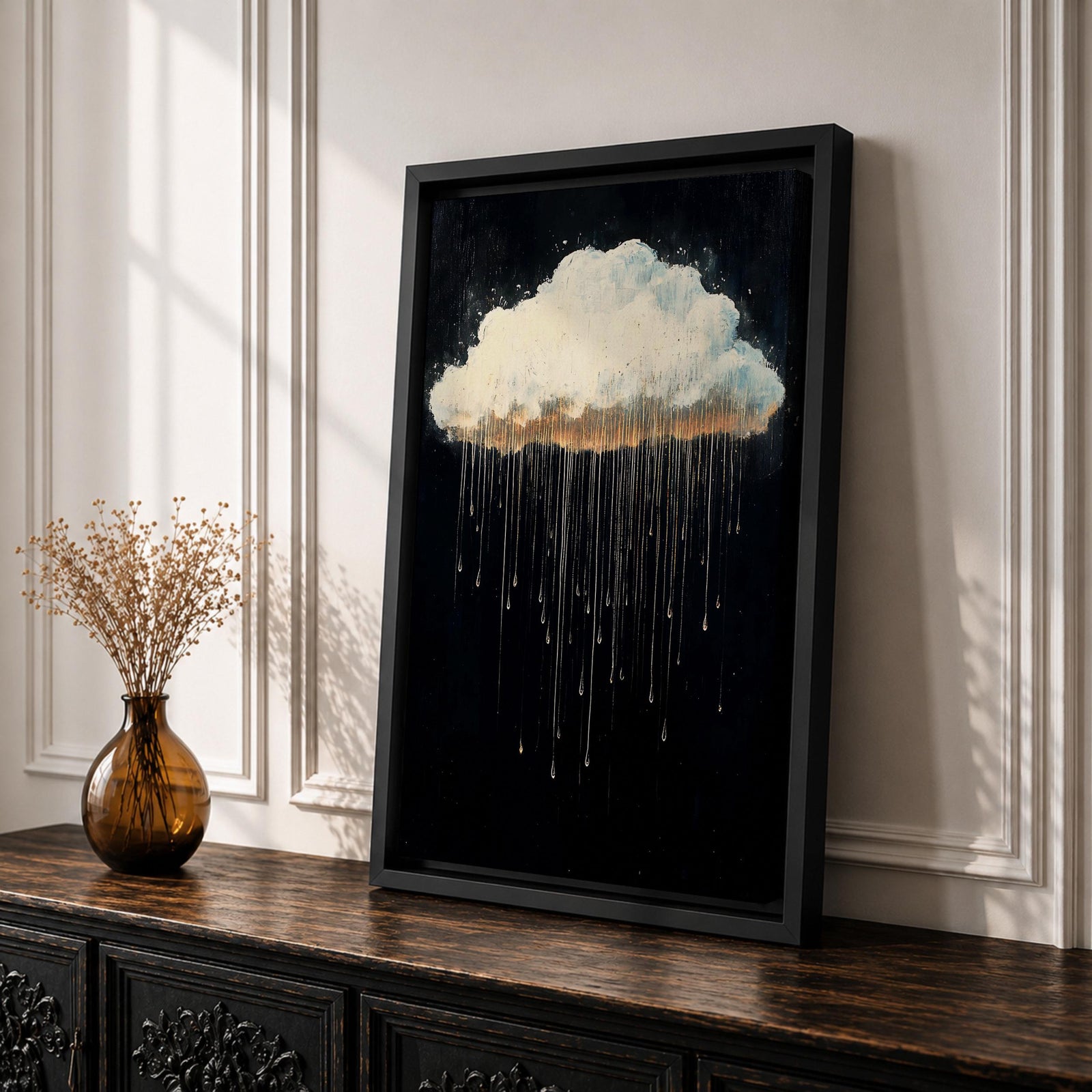 A framed canvas painting depicting a single rain cloud against a dark background with elongated raindrops dripping downward in a surreal style, emphasizing the contrast between the soft cloud and the delicate, elongated rain streaks, creating a moody and atmospheric nature-themed artwork.