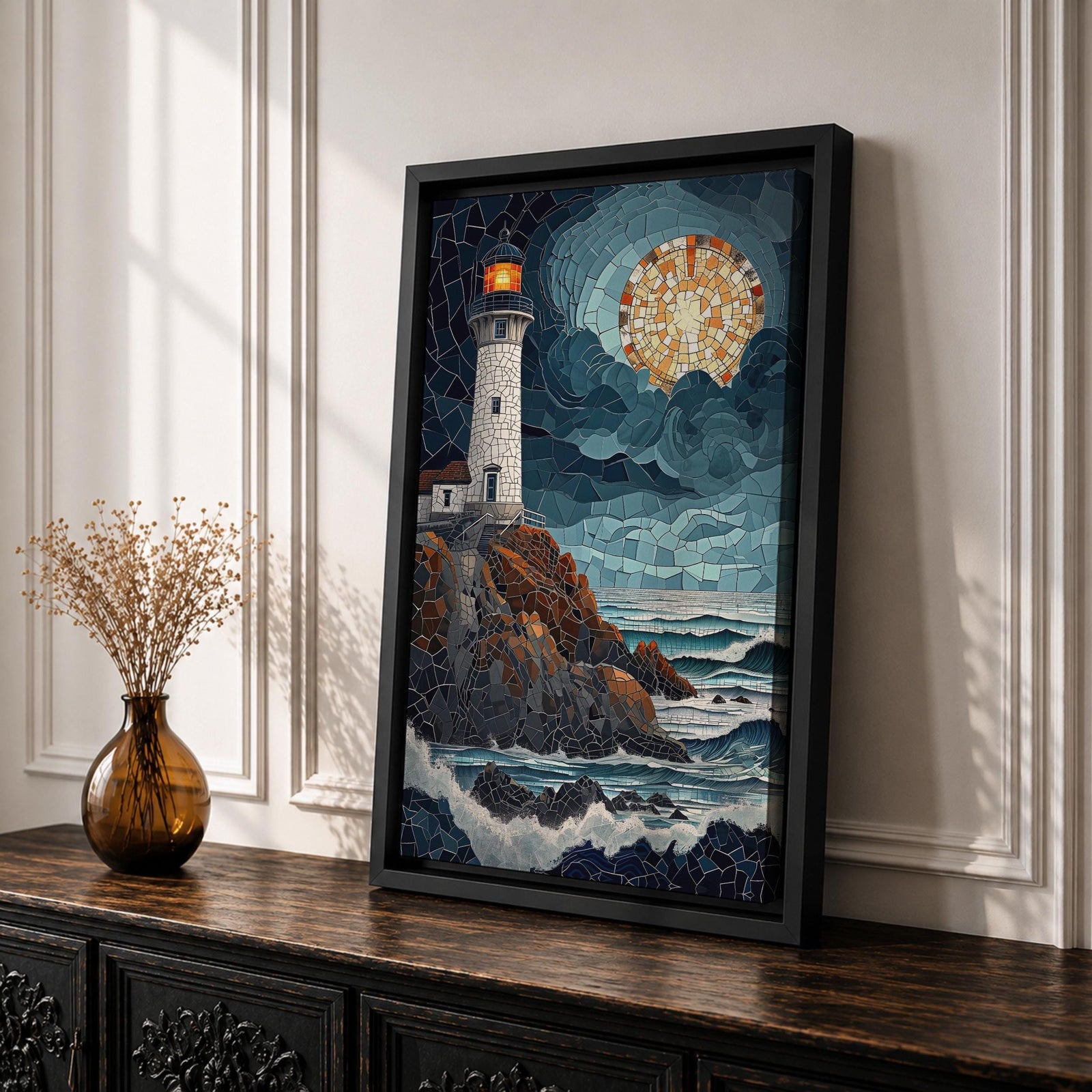 This artwork depicts a lighthouse on rocky cliffs overlooking the ocean with waves crashing below under a large glowing moon. The entire scene is rendered in a stained glass style with fragmented, colorful glass pieces forming the lighthouse, sky, moon, rocks, and sea, creating a mosaic effect.