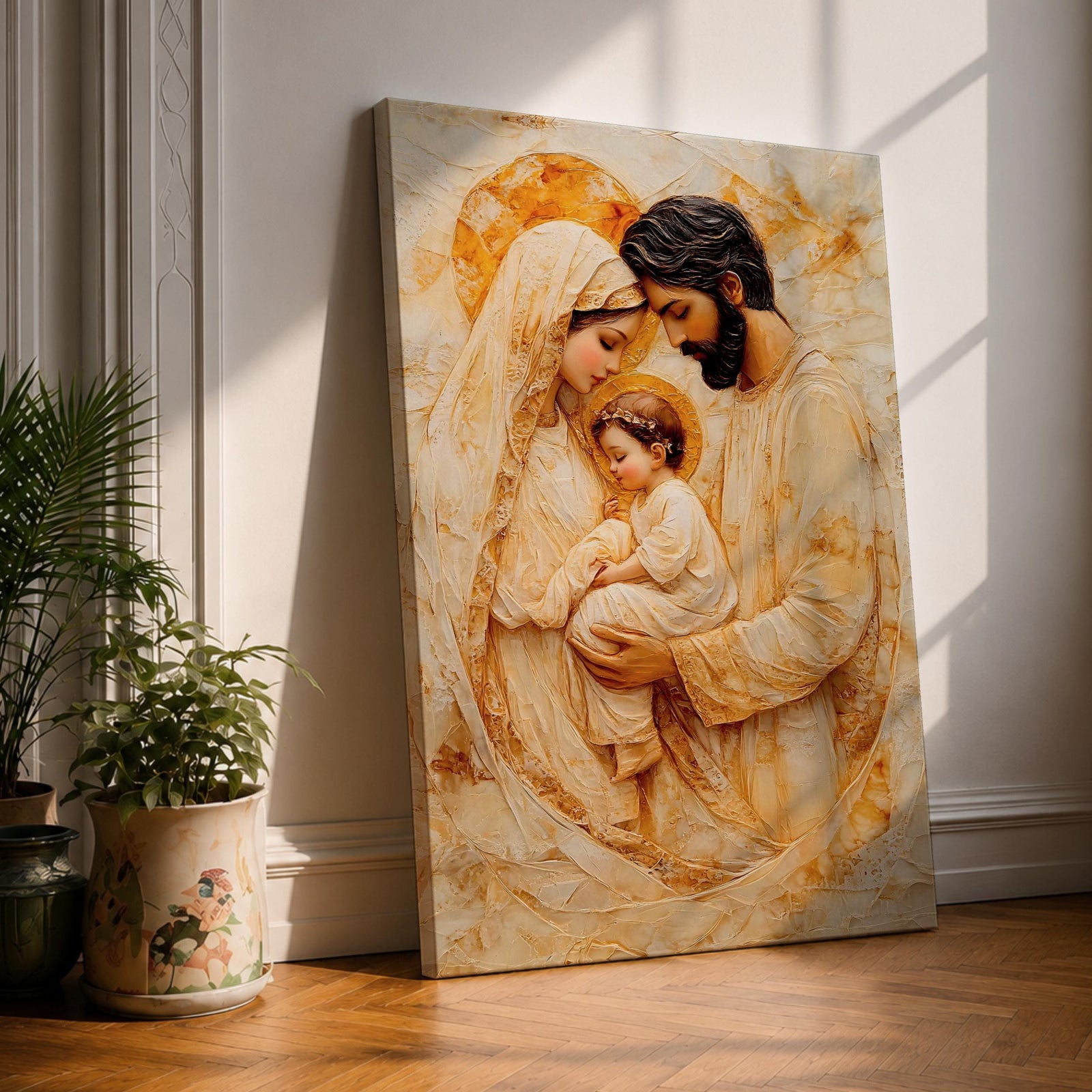 A vintage-style framed canvas depicting the Holy Family with Mary, Joseph, and baby Jesus, rendered in warm tones with Christian iconography influences. The artwork features detailed, textured brushstrokes emphasizing the tender interaction between the figures in a classic religious composition.