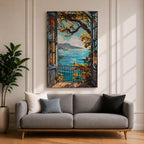 A framed canvas artwork depicting a Mediterranean balcony opening onto a vibrant coastal ocean view with sailboats on the water and leafy branches framing the scene. The style is realistic with bold, clear lines and vivid colors emphasizing the natural landscape and architectural elements.