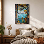 A framed canvas artwork depicting a Mediterranean balcony opening onto a vibrant coastal ocean view with sailboats on the water and leafy branches framing the scene. The style is realistic with bold, clear lines and vivid colors emphasizing the natural landscape and architectural elements.