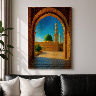 Artwork of Masjid Al Nabawi in Medina viewed through a historic stone archway with the iconic green dome and tall mosque minarets rising under a bright blue sky.