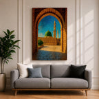 Artwork of Masjid Al Nabawi in Medina viewed through a historic stone archway with the iconic green dome and tall mosque minarets rising under a bright blue sky.