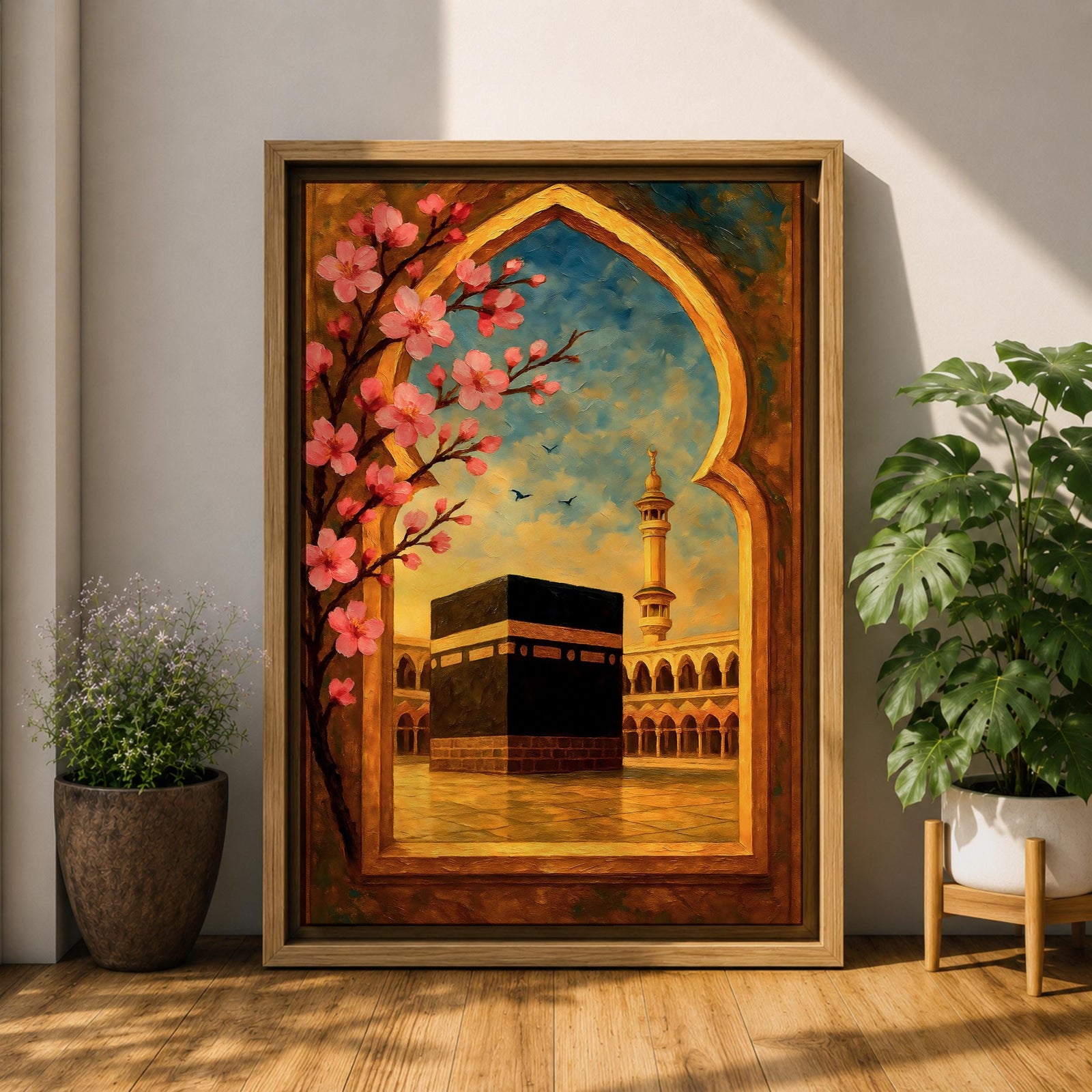 Textured oil painting of the Kaaba in Masjid Haram framed by a decorative Islamic archway with blooming pink flowers, a mosque minaret in the background, and warm sunset tones over the courtyard.