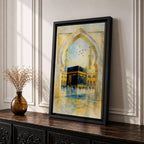 Soft watercolor artwork of the Kaaba at Masjid Al Haram framed by a Moorish pointed arch with mosque minarets and birds flying above the reflective courtyard.