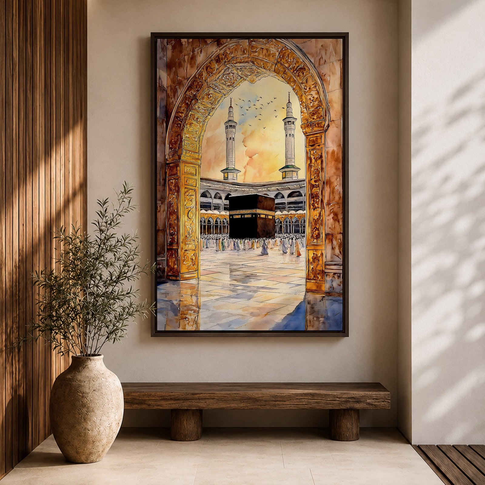 Watercolor artwork of the Kaaba in Masjid Haram viewed through an ornate mosque archway with twin minarets rising above the courtyard and pilgrims gathered around the sacred sanctuary.
