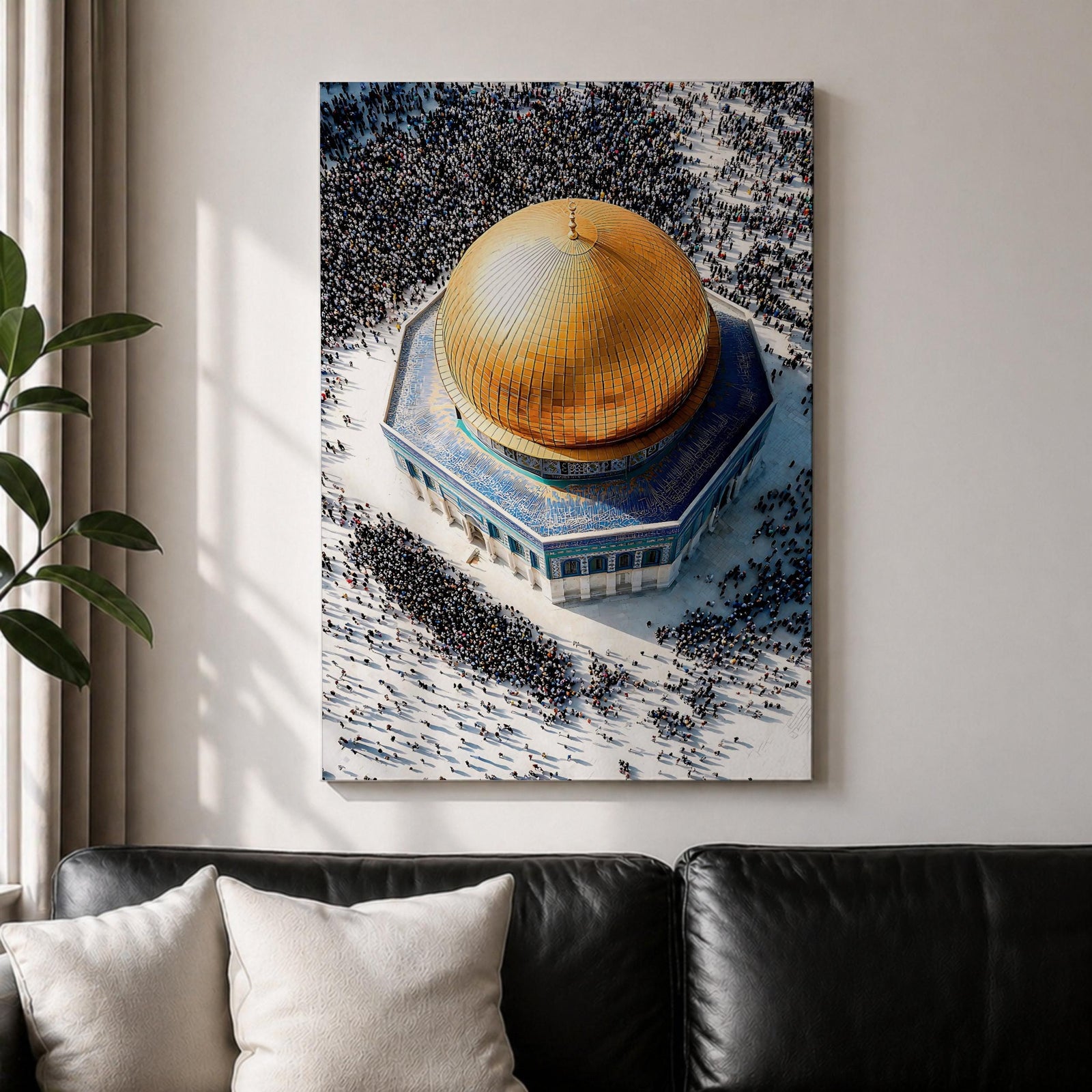 Aerial view of the Dome of the Rock in Jerusalem with its large golden dome and blue tiled octagonal structure, surrounded by crowds walking across the bright stone courtyard of the Al-Aqsa mosque compound on the Temple Mount.