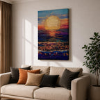 A vibrant painting of a large golden sun setting over a textured ocean horizon, featuring shimmering reflections on the water and a colorful sky blending blues, purples, and warm sunset tones. The artwork captures a peaceful coastal landscape with a focus on light and natural beauty.
