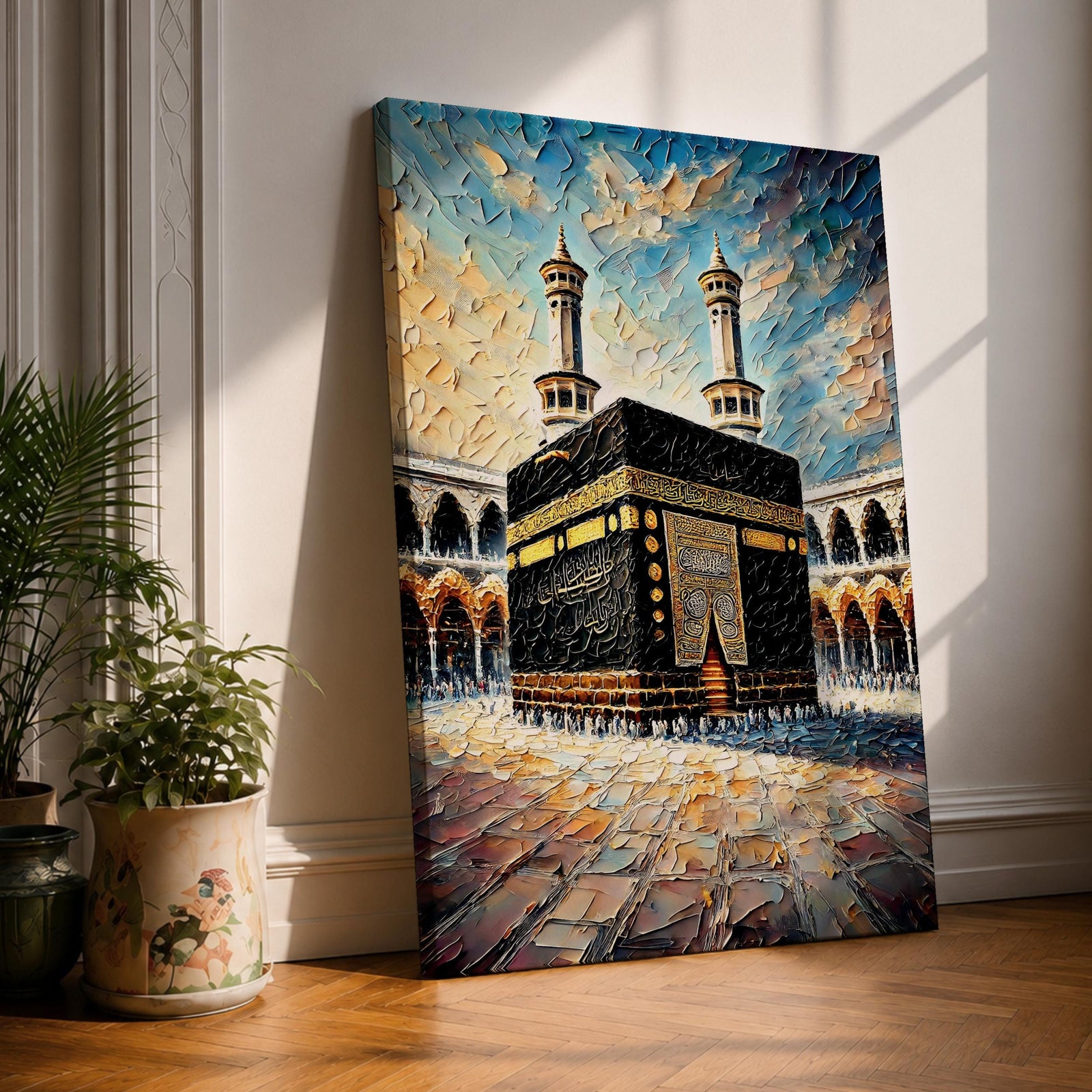 Textured painting of the Kaaba at Masjid Al Haram in Mecca showing the black cube with gold calligraphy bands centered in the mosque courtyard, surrounded by arches and two tall minarets under a dramatic blue sky rendered with thick palette knife textures.