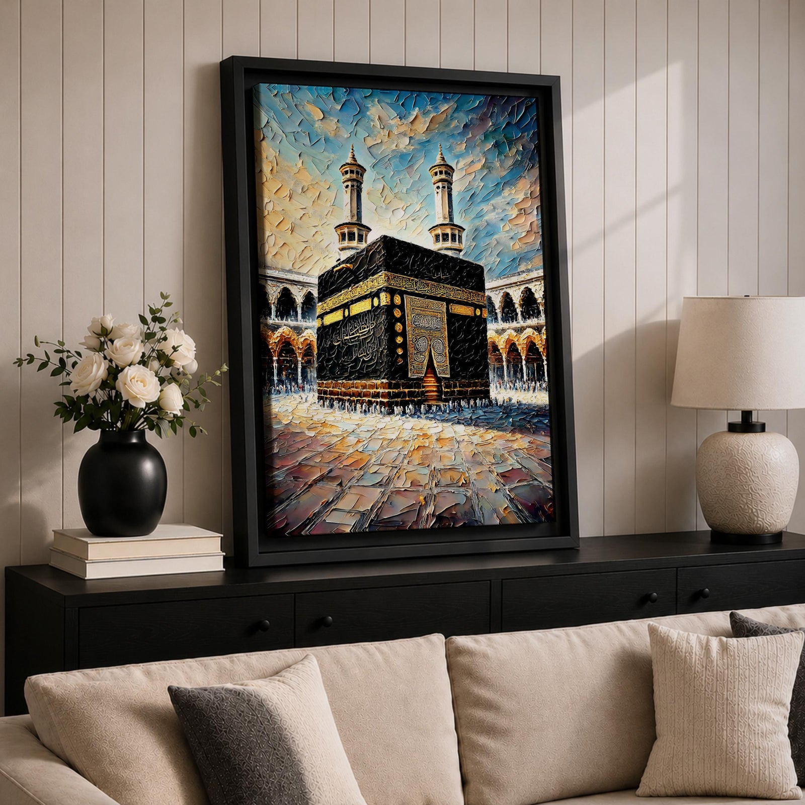 Textured painting of the Kaaba at Masjid Al Haram in Mecca showing the black cube with gold calligraphy bands centered in the mosque courtyard, surrounded by arches and two tall minarets under a dramatic blue sky rendered with thick palette knife textures.